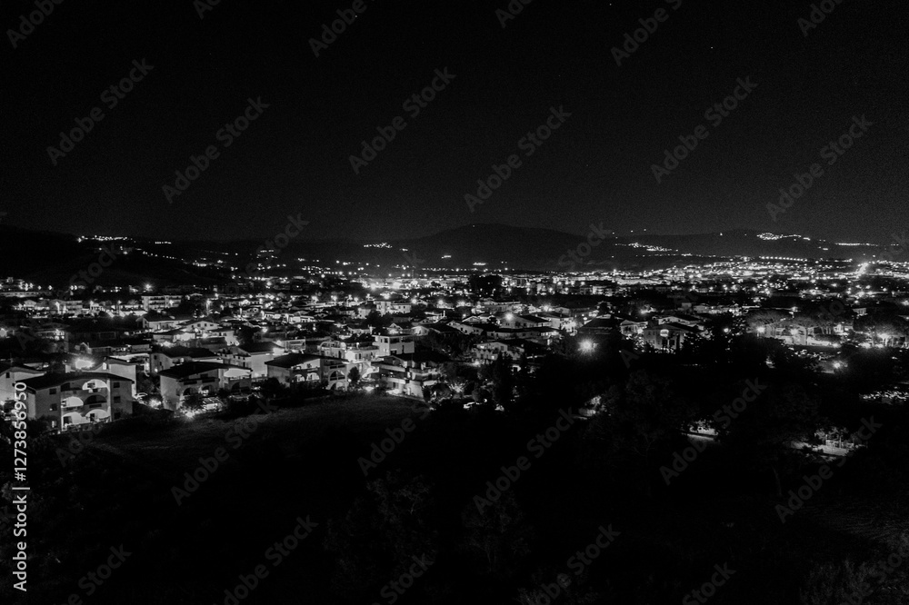 night photo from above of the city of Soverato in Calabria, Italy