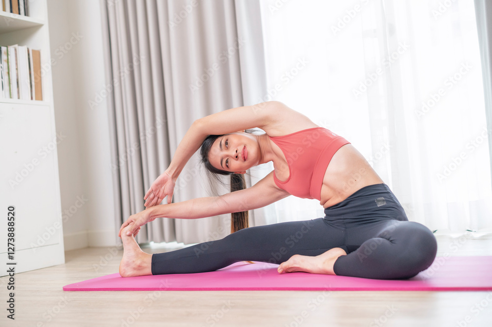 Young and Strong attractive fitness woman in sportswear exercise on yoga mat in gym - Healthy lifestyle training Concept.