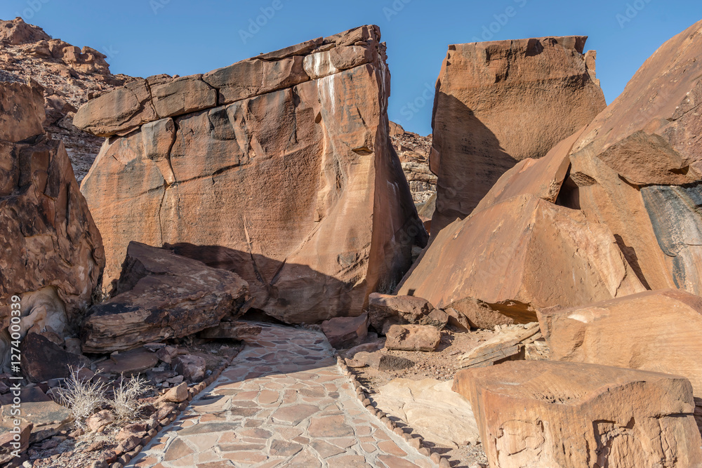 big sandstone rocks looming over path, near Twyfelfontein, Namibia