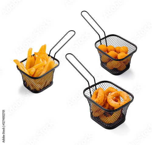 Three serving baskets with various fried snacks on a table photo