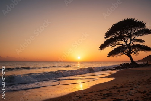 sunset on a beach with a lone tree and waves