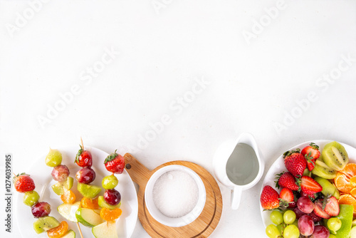 Traditional Chinese sweet street food recipe Tanghulu, fruit skewer on stick with crunchy sugar glaze, easy healthy dessert. Step by step preparation of Tanghulu with ingredients on table, top view