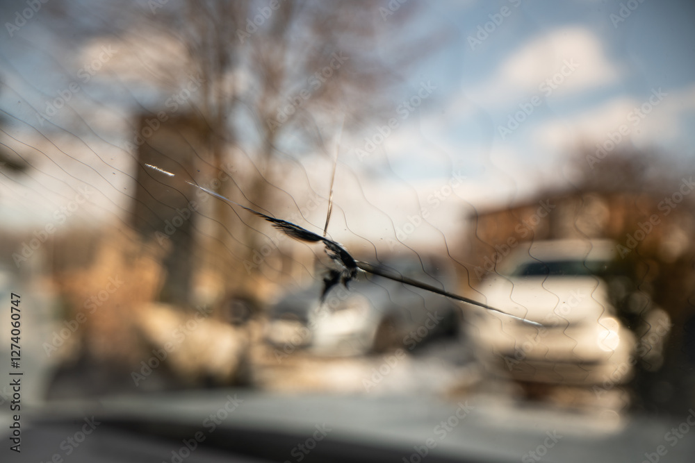 car windscreen damage - chip on heated glass