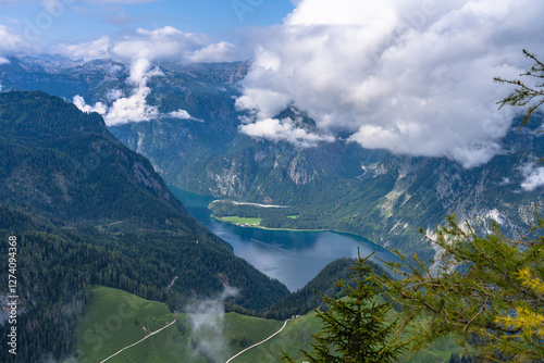 Aerial panorama view of the Koenigssee Lake and the Alps of Berchtesgadener Land from top of Jenner peak on a sunny summer day with blue sky and cloud, Bavaria, Germany