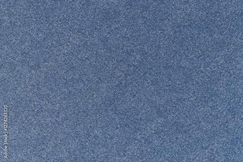 Textured blue surface with subtle patterns showcasing depth and detail