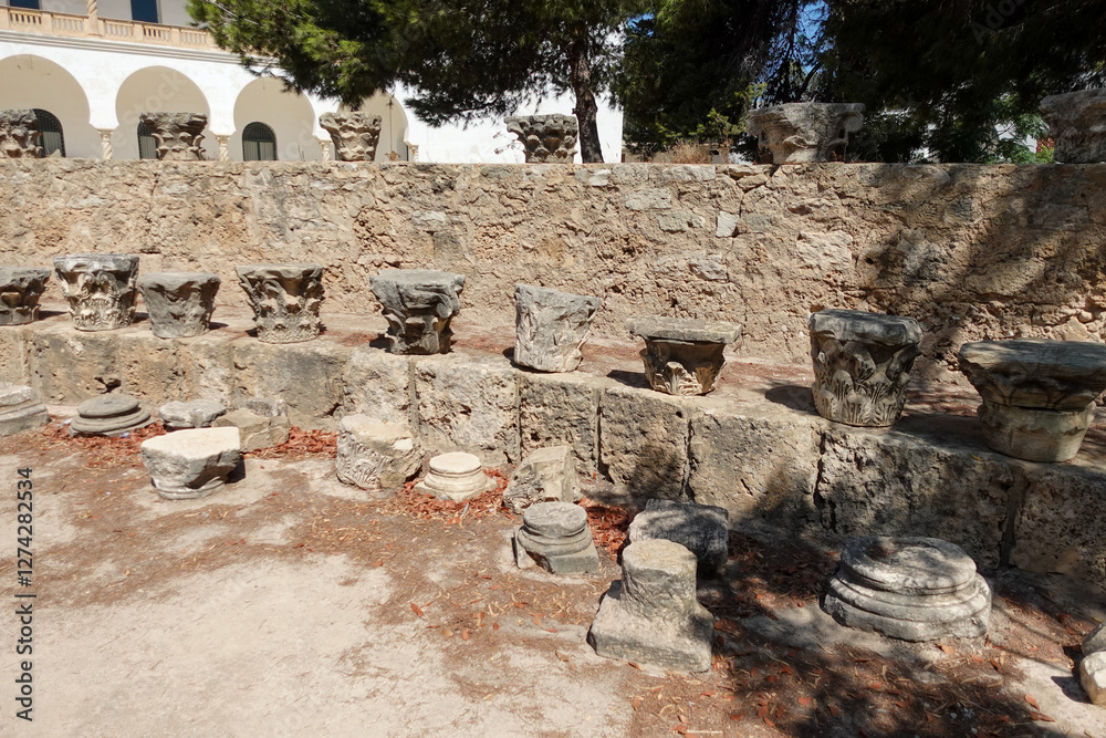Ancient Column Capitals Display in Ruins Ancient Column Capitals Display in Ruins