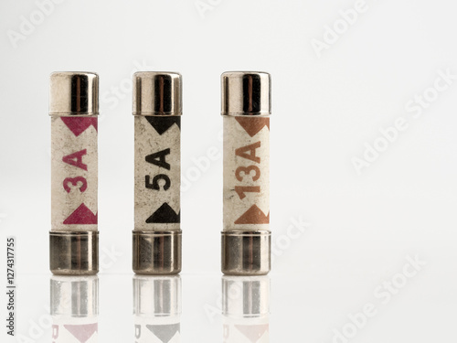 close up of the British standard appliance electrical fuses in the UK isolated on a white background
