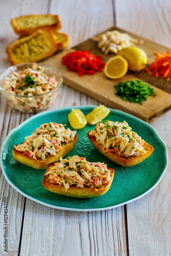 spicy crab salad served on toasted garlic bread