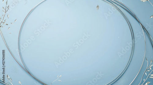 Elegant circular design with delicate floral accents on a soft blue background, ideal for invitations