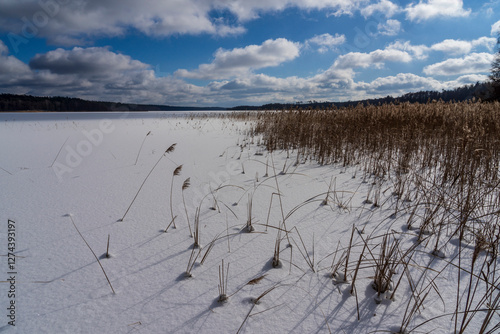 Fototapeta Naklejka Na Ścianę i Meble -  Nidzkie Lake in winter. Landscape of Masuria in Poland.