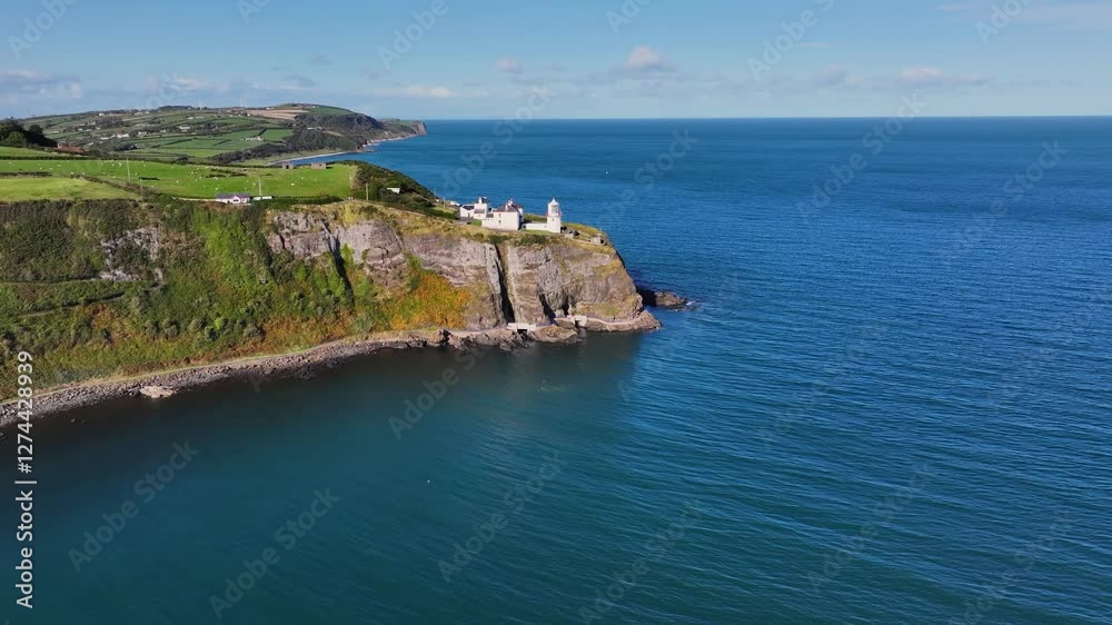 Aerial view of Blackhead Lighthouse on the beautiful and spectacular coastline of the Glens of Antrim Northern Ireland Aerial view of Blackhead Lighthouse on the beautiful and spectacular coastline of the Glens of Antrim Northern Ireland