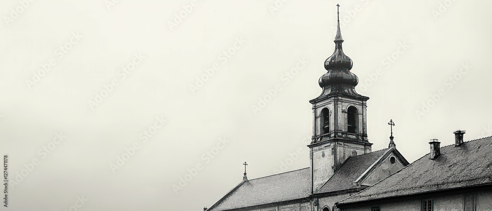 Church steeple, grey stone, misty sky Church steeple, grey stone, misty sky