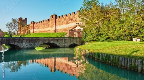 Osteria Maniscalco and bridge on Street of Francesco Maria Preti, 66 near of walls in Castle of Castelfranco Veneto, comune of Veneto, northern Italy, in province of Treviso.