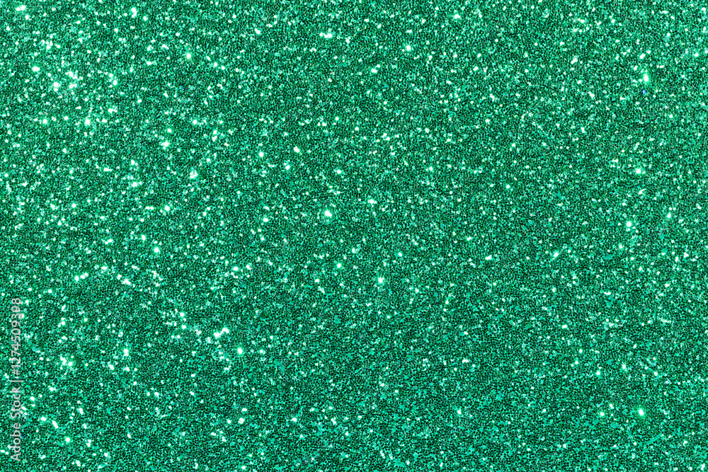 Fototapeta premium A green background with glittery specks