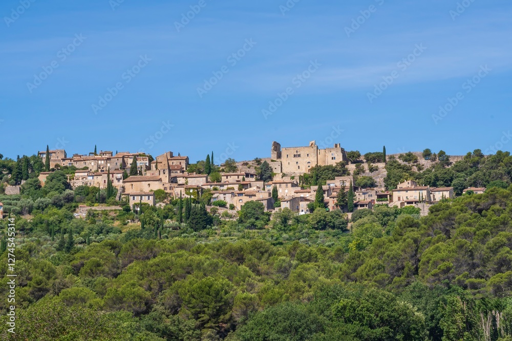 View of a small medieval village in the Provence region. View of a small medieval village in the Provence region.