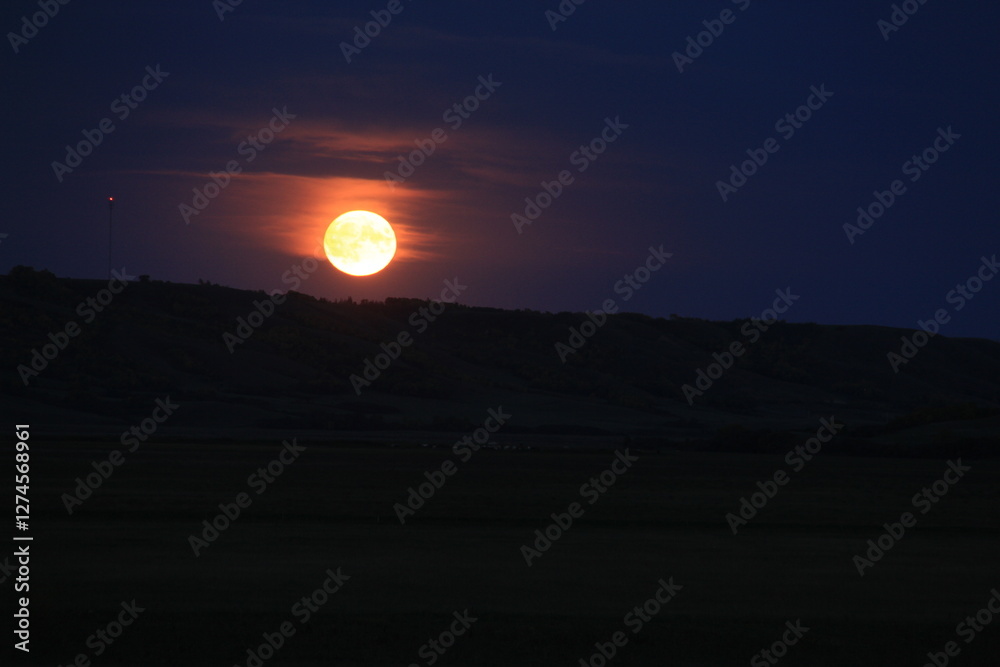 Fototapeta premium Moon rise in Qu'Appelle Valley
