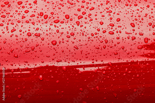 Abstract red background of wet metallic surface photo