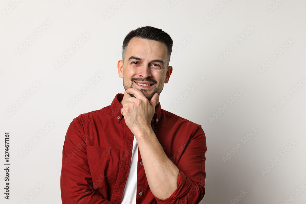 Portrait of handsome middle aged man on light background Portrait of handsome middle aged man on light background