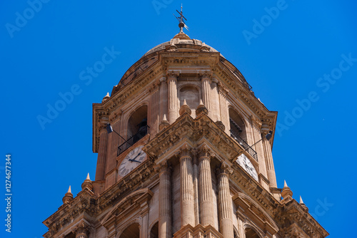 Obraz na płótnie Malaga, Spain - August 06, 2024: View at the Malaga Cathedral or Santa Iglesia Catedral Basílica de la Encarnación, an iconic national landmark ,16th-century baroque facade w salonie