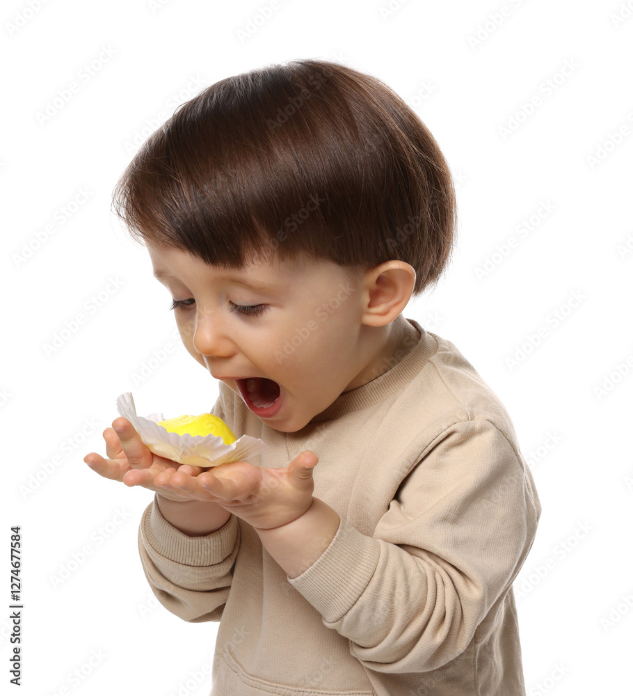 Cute little child with tasty mochi on white background Cute little child with tasty mochi on white background