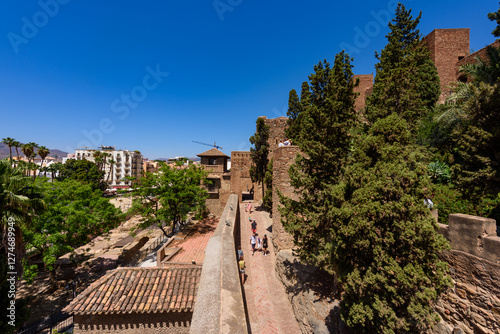 Malaga, Spain - August 06, 2024: Walls and bastion of the castle fort Gibralfaro in Malaga. Castillo de Gibralfaro.
