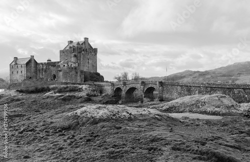 A Traditional And Stunning Scottish Castle Stretching Out Into The Loch