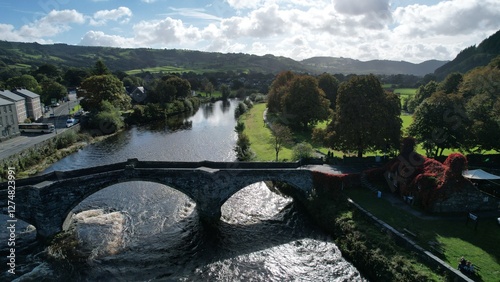 Pont Fawr (also known as Llanrwst Bridge) crosses the River Conwy in the town of Llanrwst, Conwy County Borough, Wales. Traditionally attributed to the architect Inigo Jones, it was built in 1636. photo