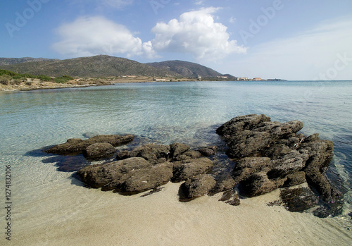 beach and sea,  sand beach rocks and sea Waves of the undertow in  Cala Reale. Isola dell'Asinara. Sassari, Sardinia, Italy
