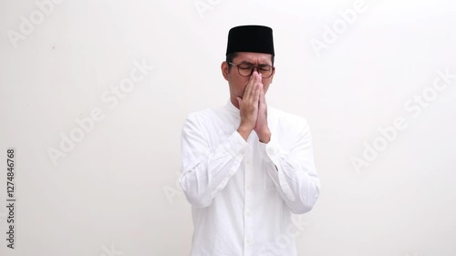 Muslim man having bad smell breath during fasting period