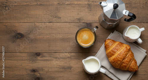 Overhead shot of coffee, croissant, and milk on wooden table. Perfect start to day