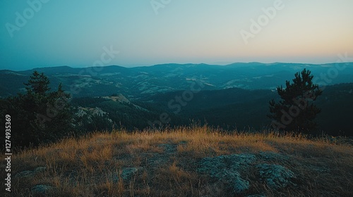 Serene Mountain Vista at Twilight Hues of Blue and Gold
