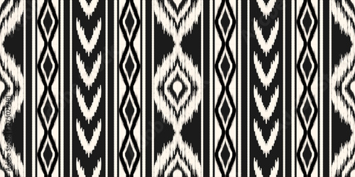 Ethnic ikat seamless pattern.beautiful pattern. floral embroidery, bohemian style, abstract flower art print. ethnic ikat abstract art. seamless fabric. ikat design for fabric, wallpaper, clothing.	
