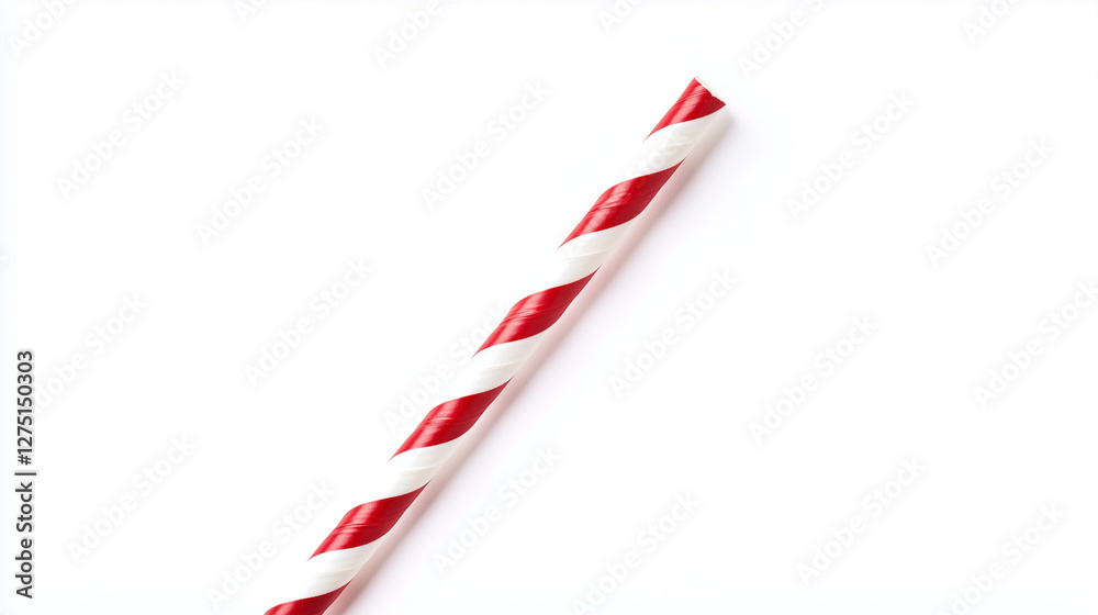 Fototapeta premium Festive Straw: A single, diagonally placed straw with red and white stripes, symbolizing a touch of festive cheer or a refreshing treat, evoking a sense of simplicity and minimalism.