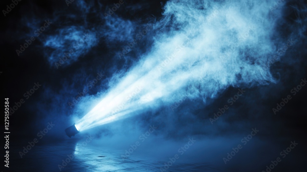 Obraz premium blue light beam cutting through smoke