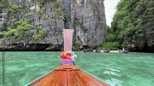 Pileh Lagoon with the green emerald ocean at Koh Phi Phi Thailand. Longtail boat at the lagoon of Koh Phi ,Phi Thailand. Pileh Lagoon Thailand tropical island in Maya bay and monkey island Phuket.