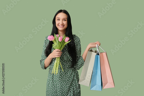 Happy young woman with shop...