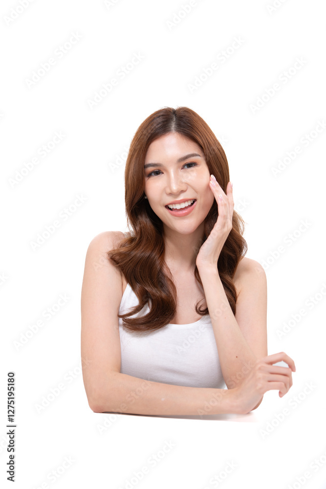 A portrait of a young Asian woman posing in a studio A portrait of a young Asian woman posing in a studio