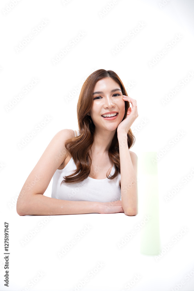A portrait of a young Asian woman posing in a studio A portrait of a young Asian woman posing in a studio