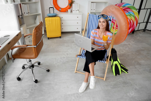 Young businesswoman with co...