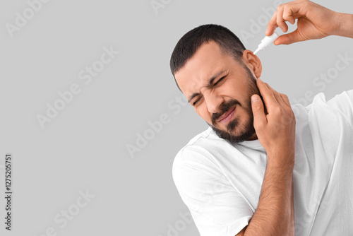 Young man with hearing prob...