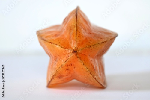 Selective front focus of a ripe star fruit photo