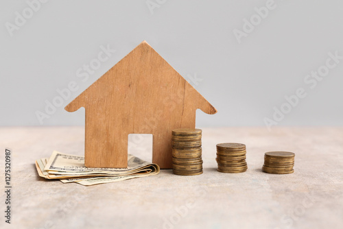 Figure of house with money ...