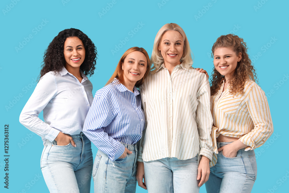 Obraz premium Group of beautiful women smiling on blue background. Women's History Month