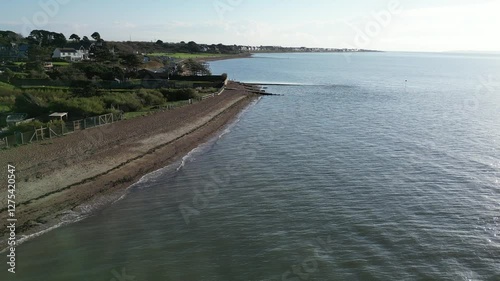Wallpaper Mural Aerial drone shot of wooden groynes on beach along south coast of England, with sea and shoreline stretching in the background. Torontodigital.ca