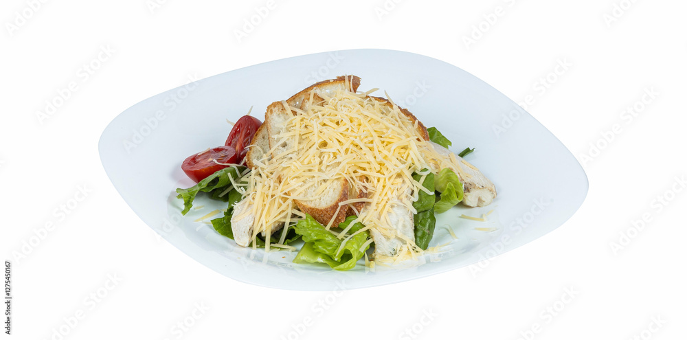 Salad with bread, cheese, lettuce, and tomatoes on a plate Salad with bread, cheese, lettuce, and tomatoes on a plate