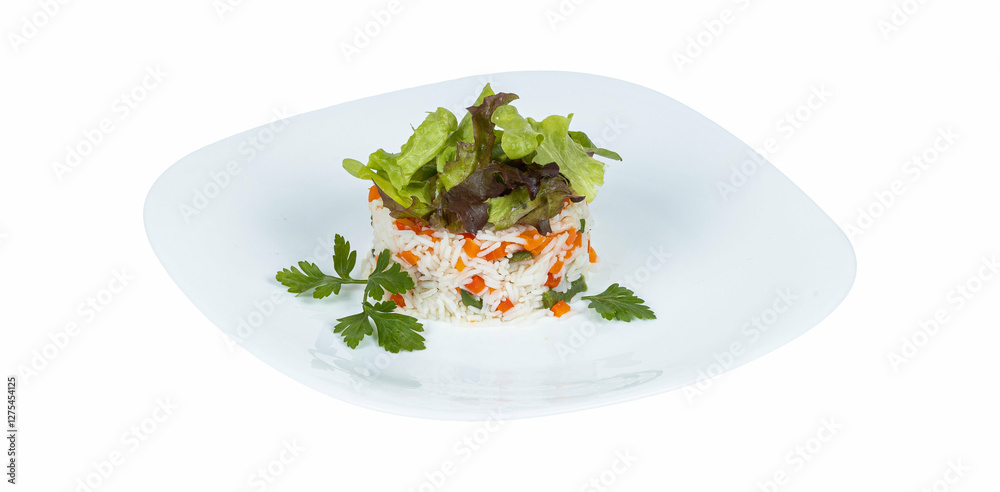 A white plate with rice and lettuce on a clean white background A white plate with rice and lettuce on a clean white background