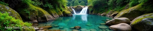 Moss covered boulders surrounding crystal clear pool, scenery, lush green valley, waterfalls