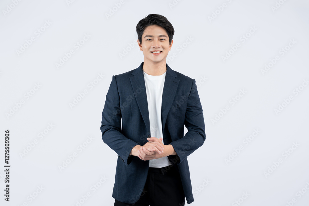 Portrait of young Asian business man posing on white background Portrait of young Asian business man posing on white background