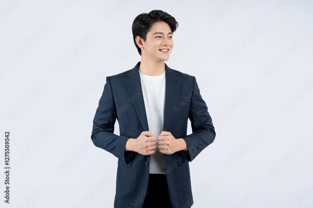 Portrait of young Asian business man posing on white background Portrait of young Asian business man posing on white background