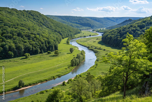 Meandering river through a green valley